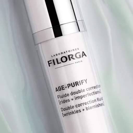 Flacon de Filorga Age-Purify Fluide Double Correction, ciblant rides et imperfections.